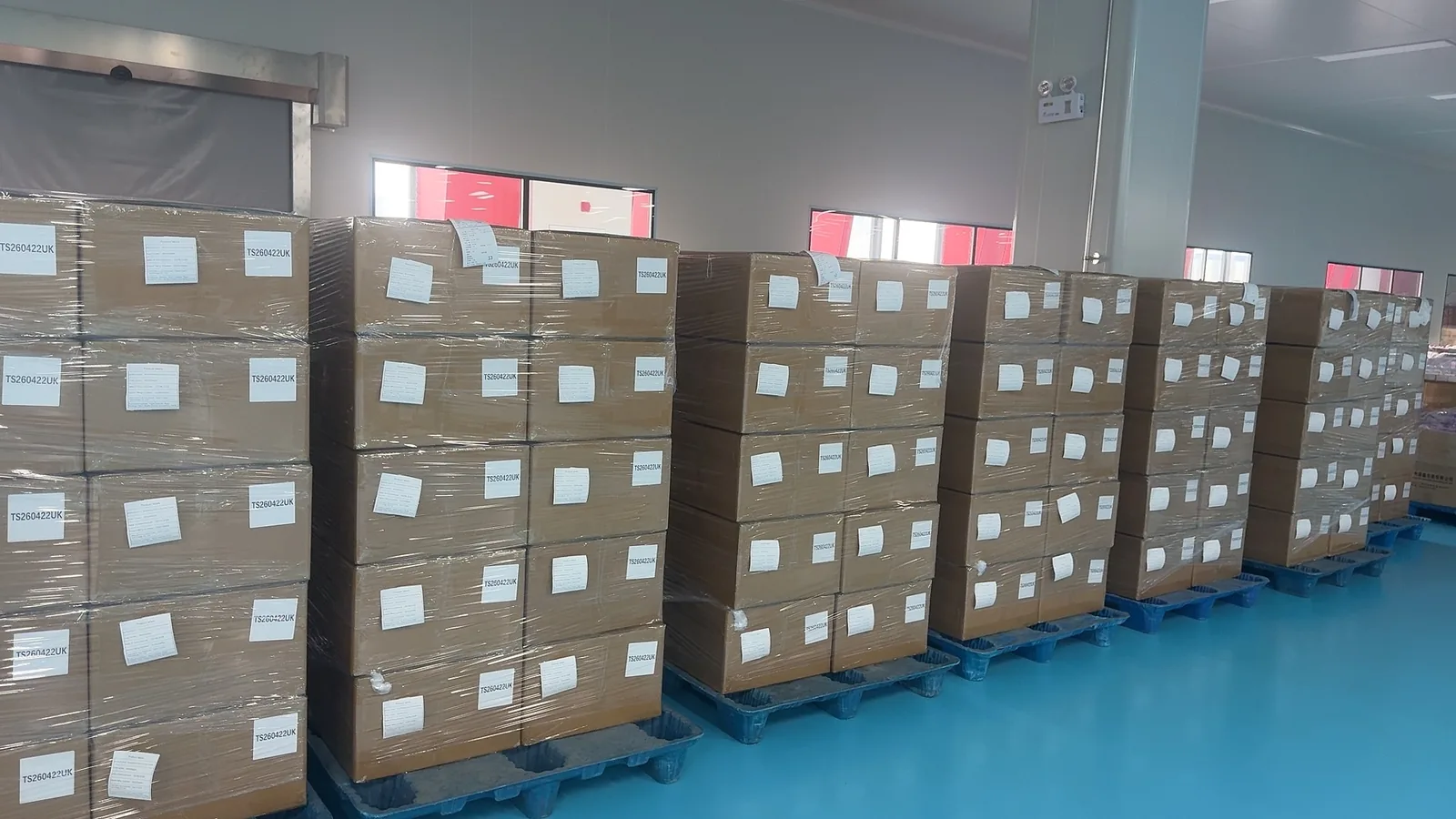 Packed supplement cartons in NuCoreBio warehouse area